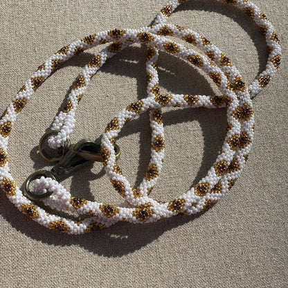 Cordon de Téléphone en Perles de verre – unique, tendance et  responsable  #A31 blanc, doré et bronze