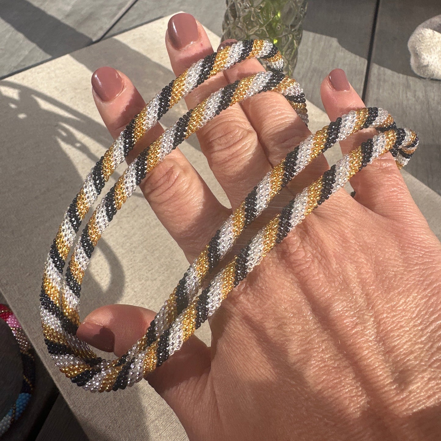 Cordon de Téléphone en Perles de verre – unique, tendance et  responsable  #A34 doré noir et transparent