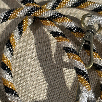 Cordon de Téléphone en Perles de verre – unique, tendance et  responsable  #A34 doré noir et transparent