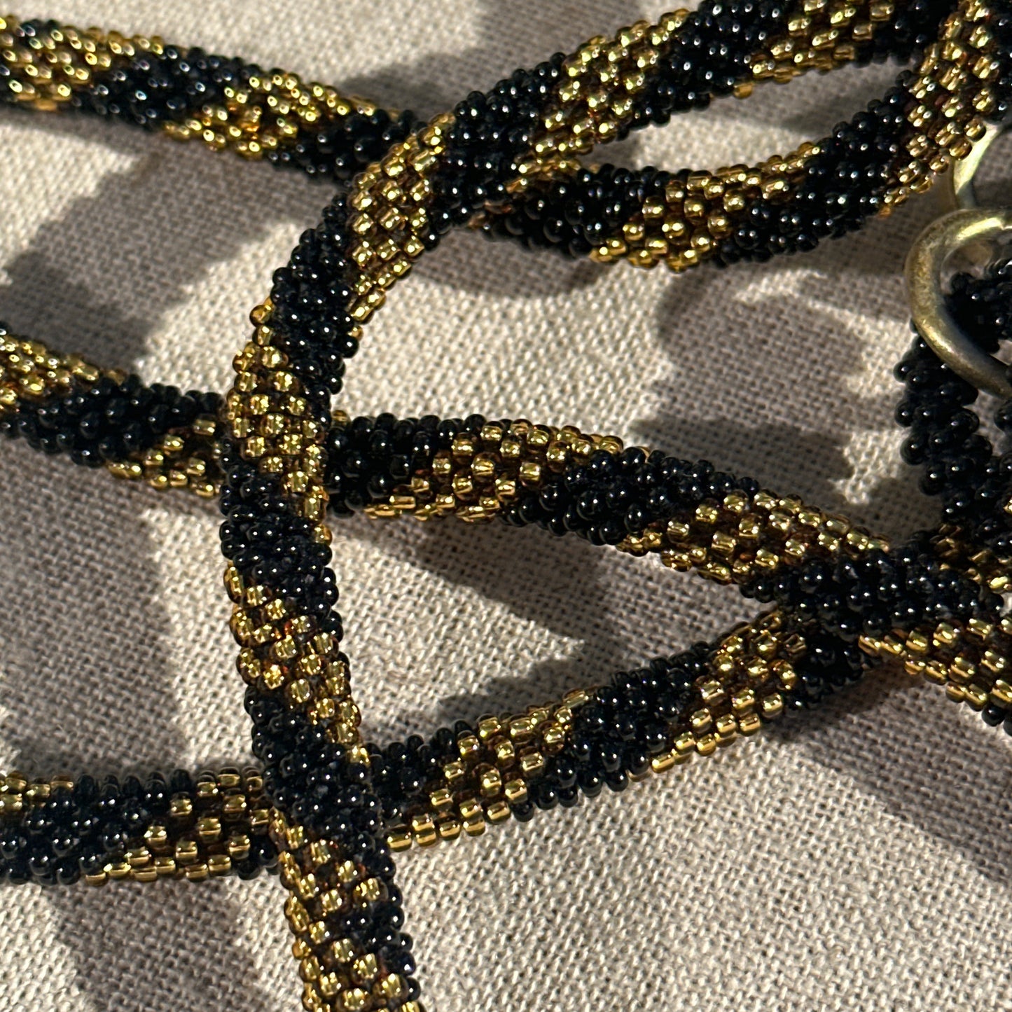 Cordon de Téléphone en Perles de verre – unique, tendance et  responsable  #A36 doré et noir