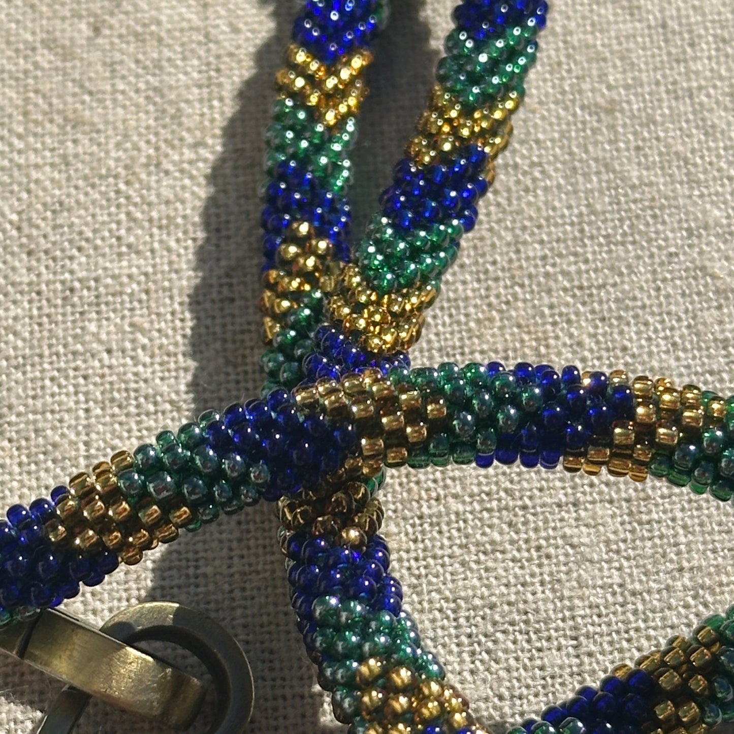 Cordon de Téléphone en Perles de verre – unique, tendance et  responsable  #A29 bleu marine, vert et doré