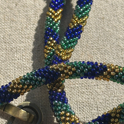 Cordon de Téléphone en Perles de verre – unique, tendance et  responsable  #A29 bleu marine, vert et doré